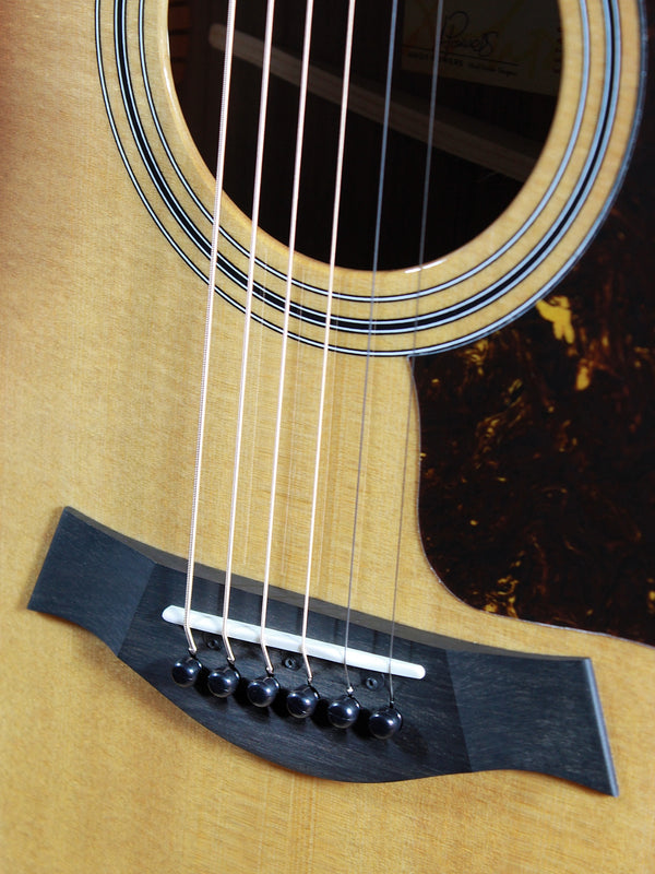 Ebony bridge and saddle detail on Taylor 414ce Studio SEB