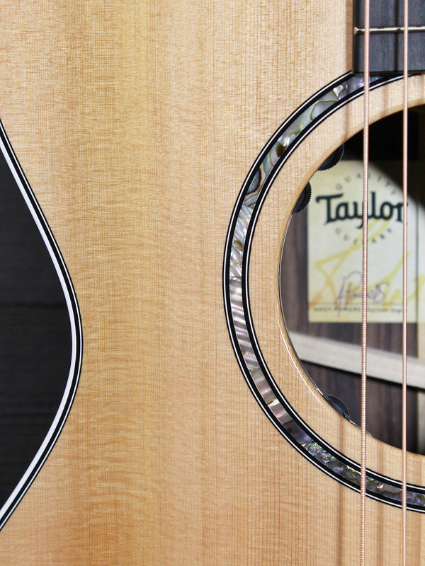    Soundhole and rosette detail on Taylor 712ce guitar