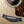 Load image into Gallery viewer, Taylor 814ce Limited Edition Casablanca Beige Metallic acoustic guitar showing bridge and saddle
