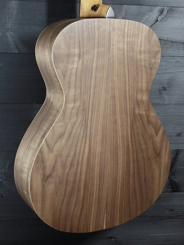 Taylor A12e-N Academy Series nylon string acoustic guitar walnut back glamour shot