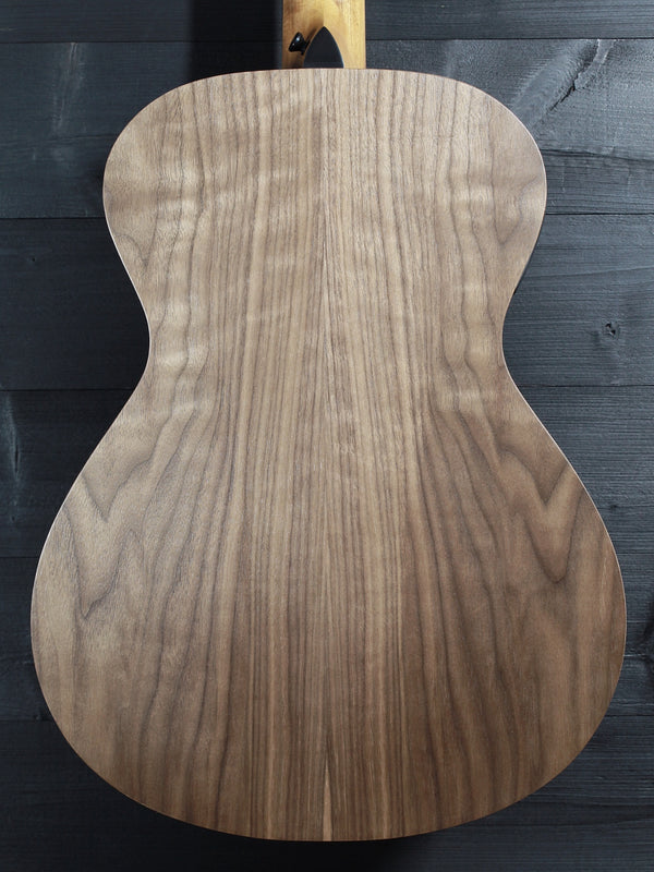 Taylor A12e-N Academy Series nylon string acoustic guitar walnut back close up