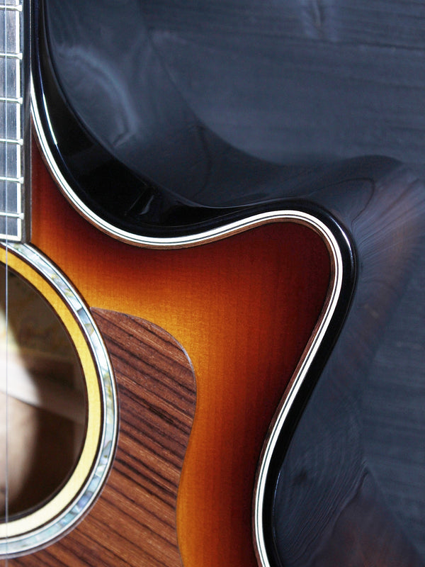 Taylor Builder’s Edition Next Generation 814ce acoustic guitar with Adirondack Spruce top and Shaded Edgeburst finish with cutaway.
