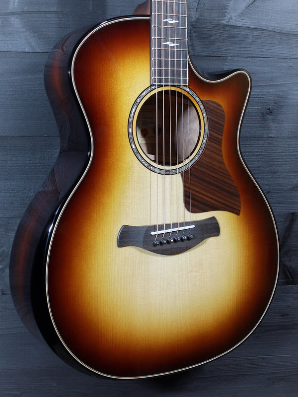 Three-quarter view of the Taylor Builder’s Edition Next Generation 814ce featuring Honduran Rosewood back and sides.