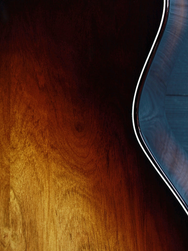 Beautiful figured Honduran Rosewood back showcasing exceptional grain and Shaded Edgeburst finish.