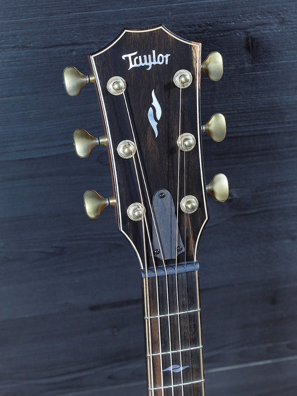 Taylor peghead with ebony overlay and Gotoh 510 Antique Gold tuning machines.