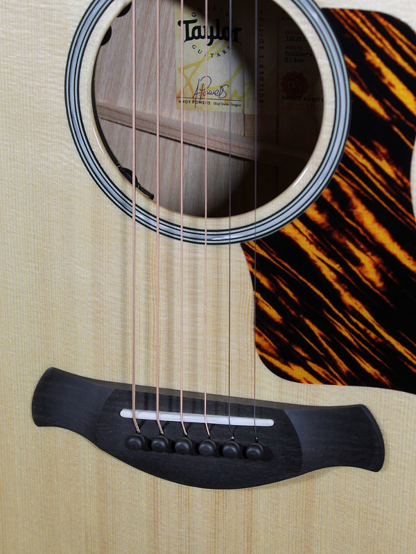 Taylor Builder’s Edition 514ce acoustic guitar bridge and saddle at Tobias Music