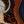 Load image into Gallery viewer, Kona Burst finish detail on Taylor Builder’s Edition 514ce with firestripe pickguard 
