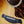 Load image into Gallery viewer, Kona Burst finish detail on Taylor Builder’s Edition 514ce Bridge and saddle
