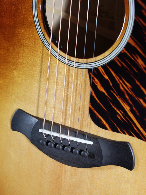Kona Burst finish detail on Taylor Builder’s Edition 514ce Bridge and saddle