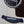 Load image into Gallery viewer, Taylor Builder’s Edition 814ce Next Generation acoustic guitar Bridge and saddle. Ebony bridge pins with abalone dots
