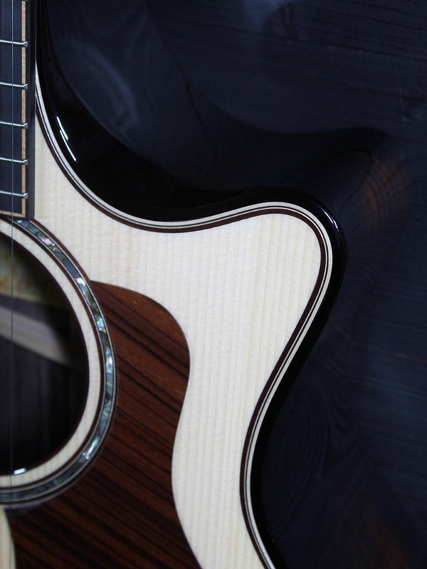 Taylor Builder’s Edition 814ce Next Generation acoustic guitar Front view of cutaway.