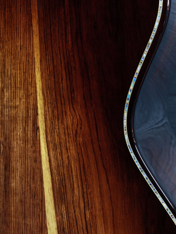 Honduran rosewood back on Taylor Builder’s Edition 914ce Next Generation acoustic guitar