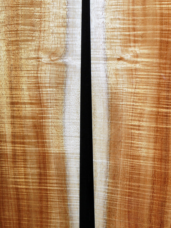 Premium Hawaiian Koa back on Taylor Custom acoustic guitar ebony mini wedge on back