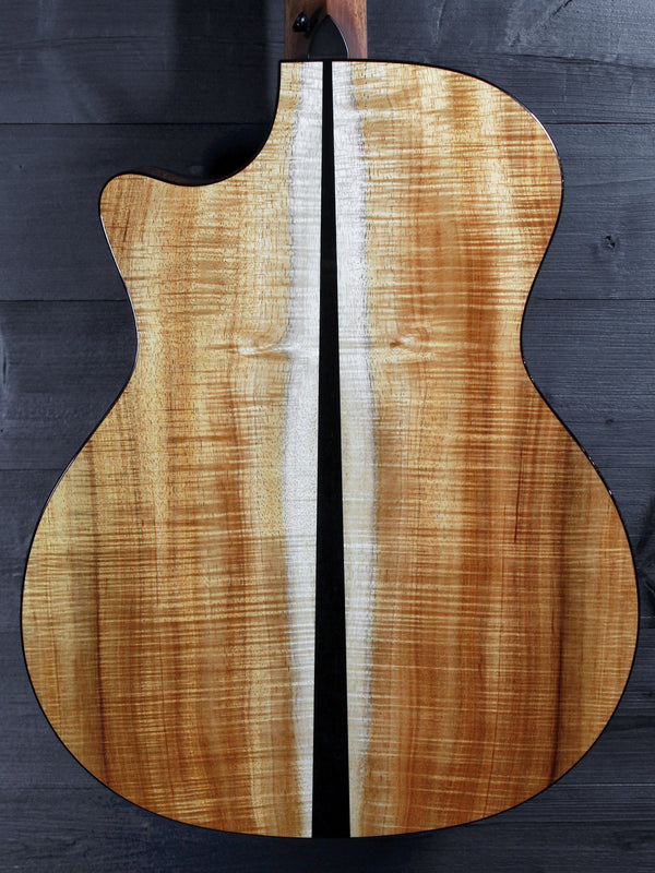 Premium Hawaiian Koa back on Taylor Custom acoustic guitar back view