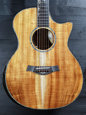 Premium Hawaiian Koa back on Taylor Custom acoustic guitar front view