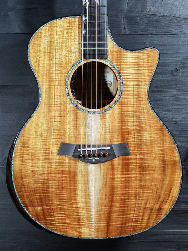 Premium Hawaiian Koa back on Taylor Custom acoustic guitar front view