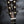 Load image into Gallery viewer, Premium Hawaiian Koa back on Taylor Custom acoustic guitar headstock with black marbled tuner buttons
