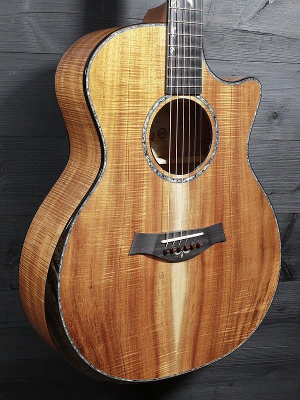 Premium Hawaiian Koa back on Taylor Custom acoustic guitar glamour shot top