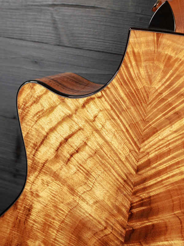 Taylor NAMM C14ce B5028 – GA Western Red Cedar/Figured AA-Grade Hawaiian Koa