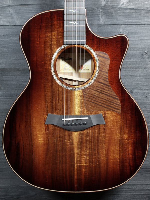 Taylor Next Generation K24ce Special Edition Hawaiian Koa acoustic electric guitar front close up