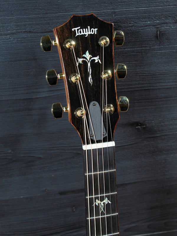 Taylor Legacy 914ce headstock with gold tuning machines and floral inlay