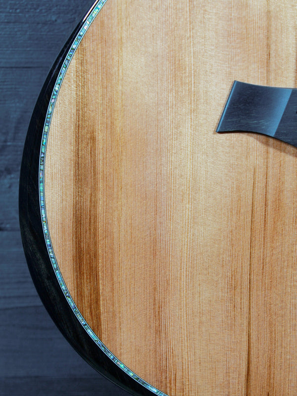 Comfort bevel armrest detail on Taylor PS14ce luxury acoustic guitar