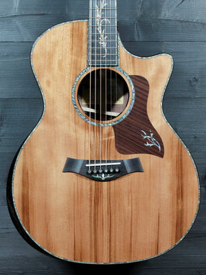 Taylor PS14ce Presentation Series acoustic-electric guitar with sinker redwood top and premium abalone appointments.